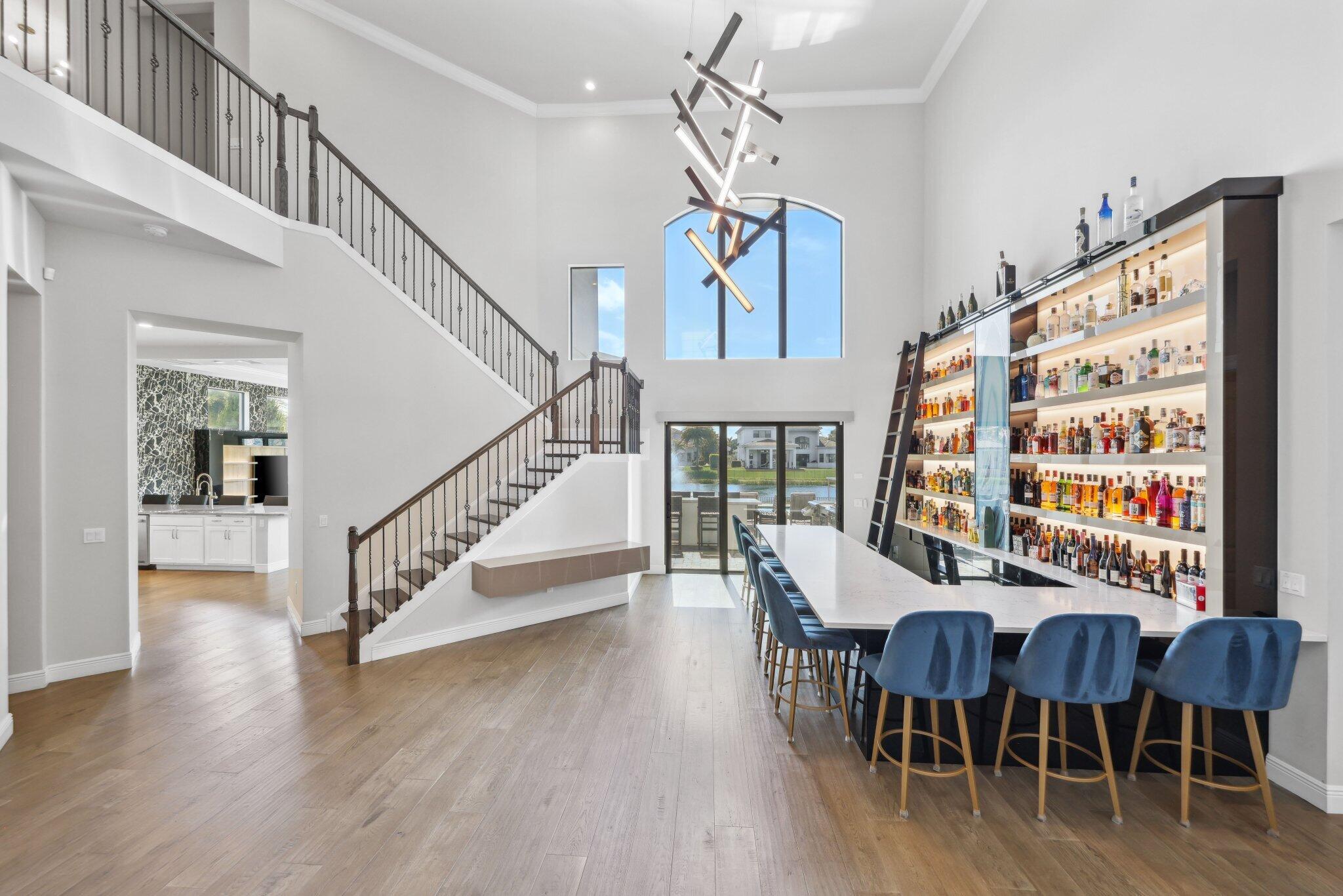 6950 Northwest 25th Way Boca Raton, FL 33496 - Photo 5 of 90 Foyer/ Custom bar