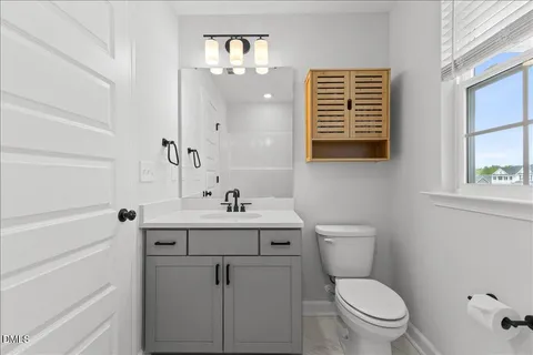 a bathroom with a bathtub and a sink
