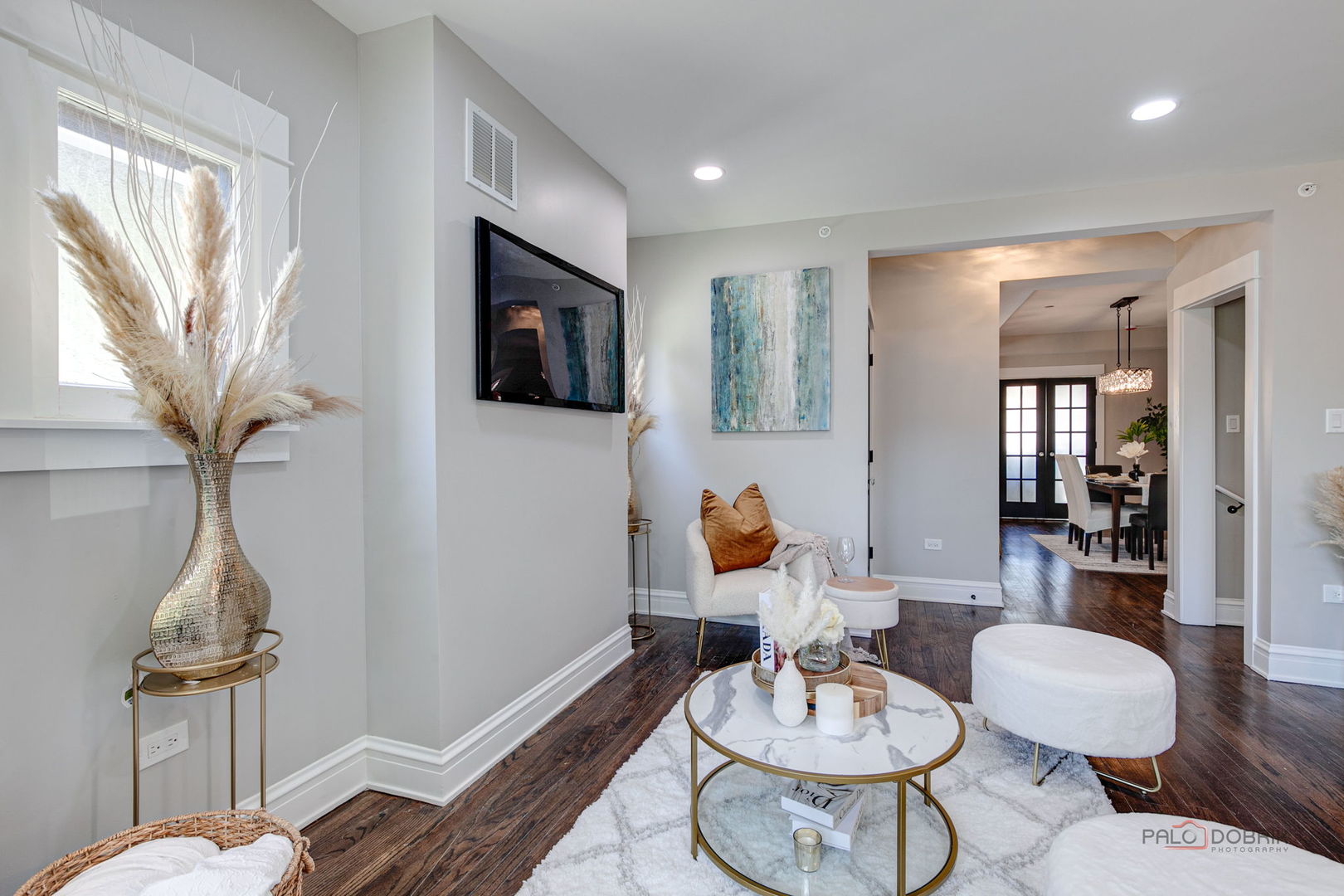 842 Mapleton Avenue Oak Park, IL 60302 - Photo 6 of 34 a view of a livingroom with furniture a chandelier and wooden floor