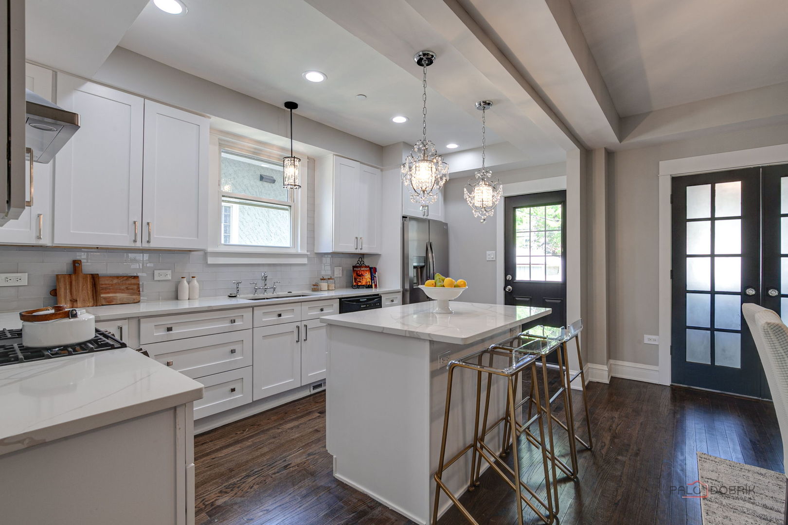 842 Mapleton Avenue Oak Park, IL 60302 - Photo 8 of 34 a kitchen with a sink a center island cabinets and a window