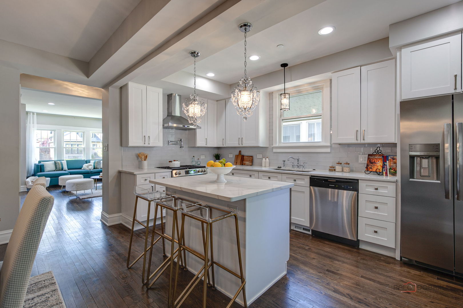 842 Mapleton Avenue Oak Park, IL 60302 - Photo 9 of 34 a kitchen with stainless steel appliances granite countertop a stove a sink dishwasher a refrigerator and white cabinets with wooden floor