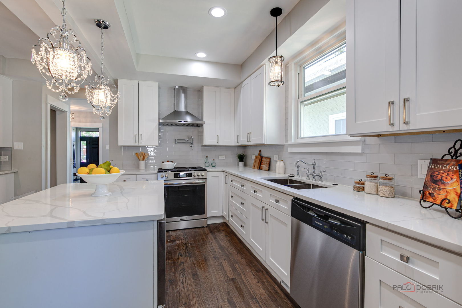 842 Mapleton Avenue Oak Park, IL 60302 - Photo 10 of 34 a kitchen with a sink cabinets stainless steel appliances and a window