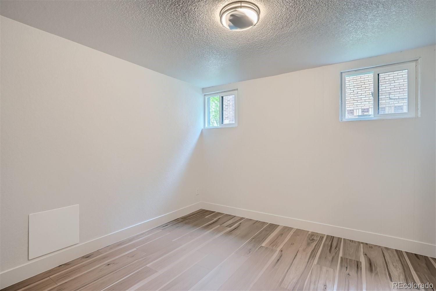 1400 Perry Street Denver, CO 80204 - Photo 23 of 26 an empty room with a window