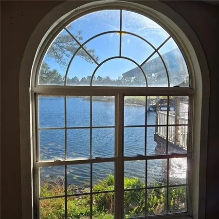 a view of a wooden door with a outdoor space