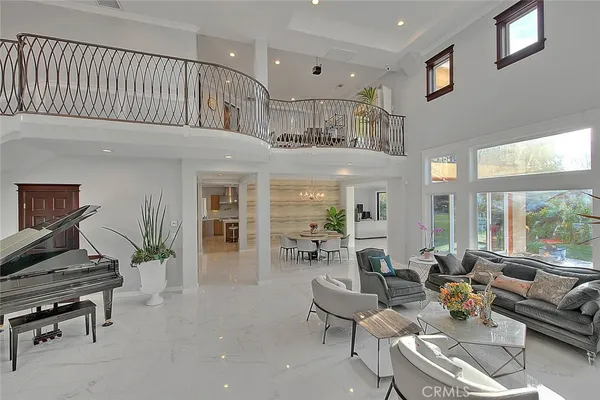 a view of a balcony with furniture
