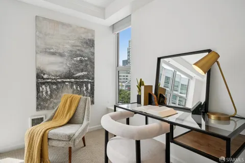 a view of balcony with furniture