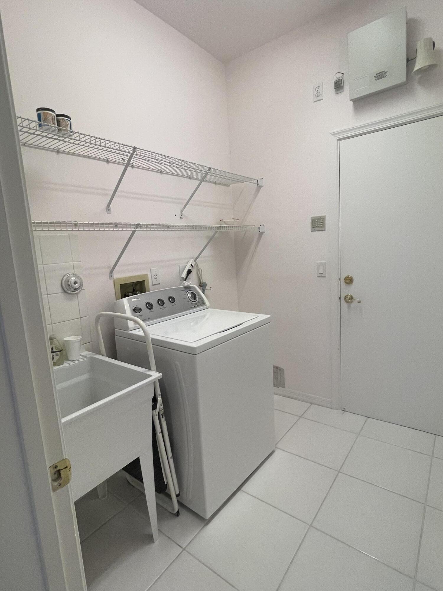 22324 Rushmore Place Boca Raton, FL 33428 - Photo 12 of 33 a utility room with dryer and washer