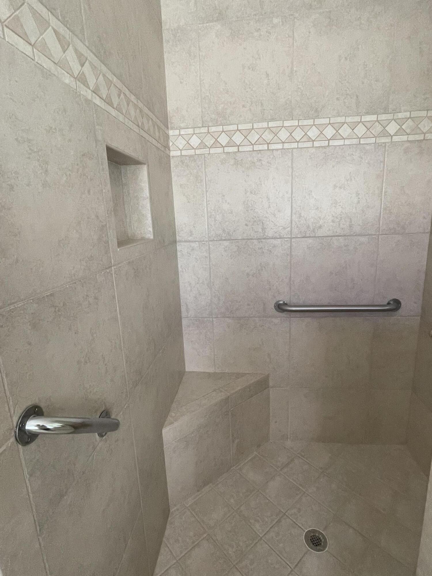 22324 Rushmore Place Boca Raton, FL 33428 - Photo 23 of 33 a bathroom with a shower
