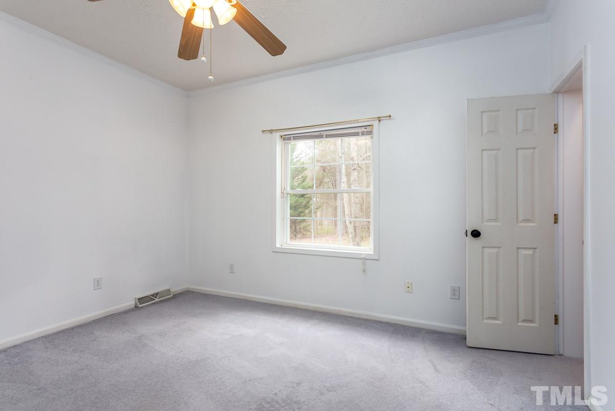 3882 Millard Whitley Road Chapel Hill, NC 27516 - Photo 14 of 20 an empty room with a window
