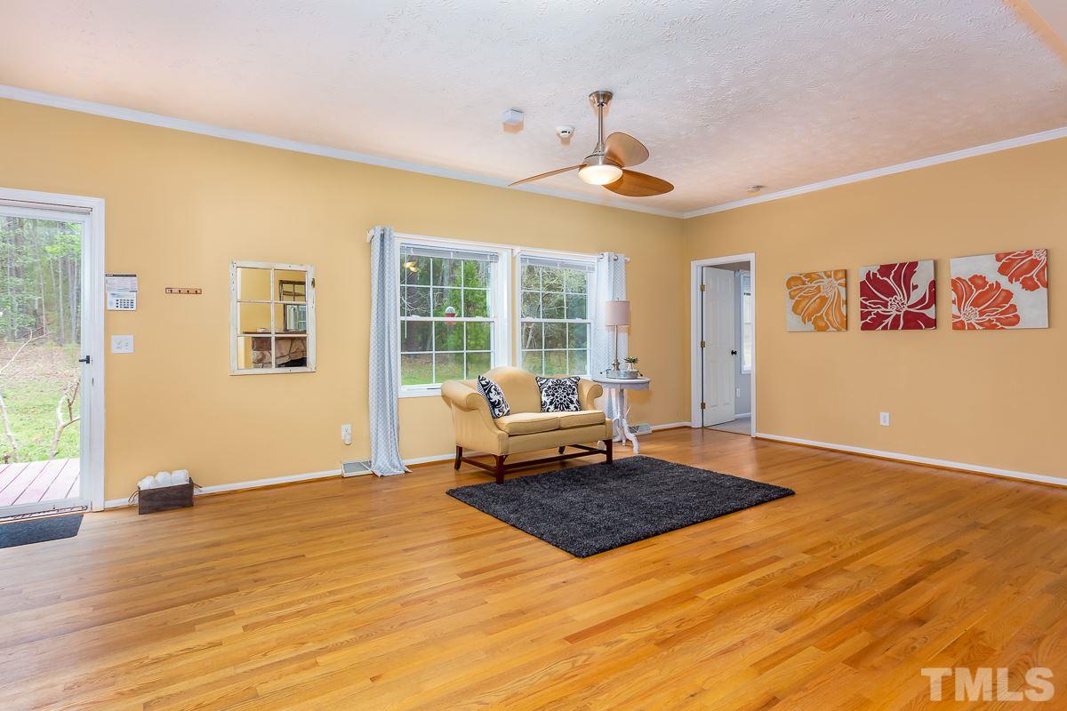 3882 Millard Whitley Road Chapel Hill, NC 27516 - Photo 3 of 20 a living room with dining area
