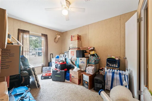 a room with refrigerator and washer
