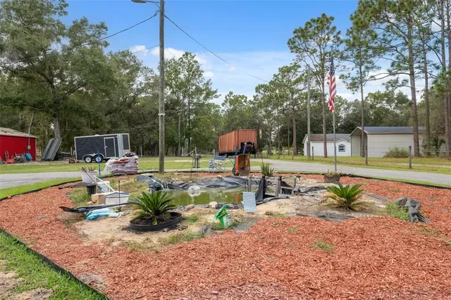 a view of a bench in the garden