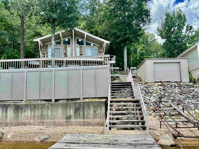 a view of swimming pool from a balcony