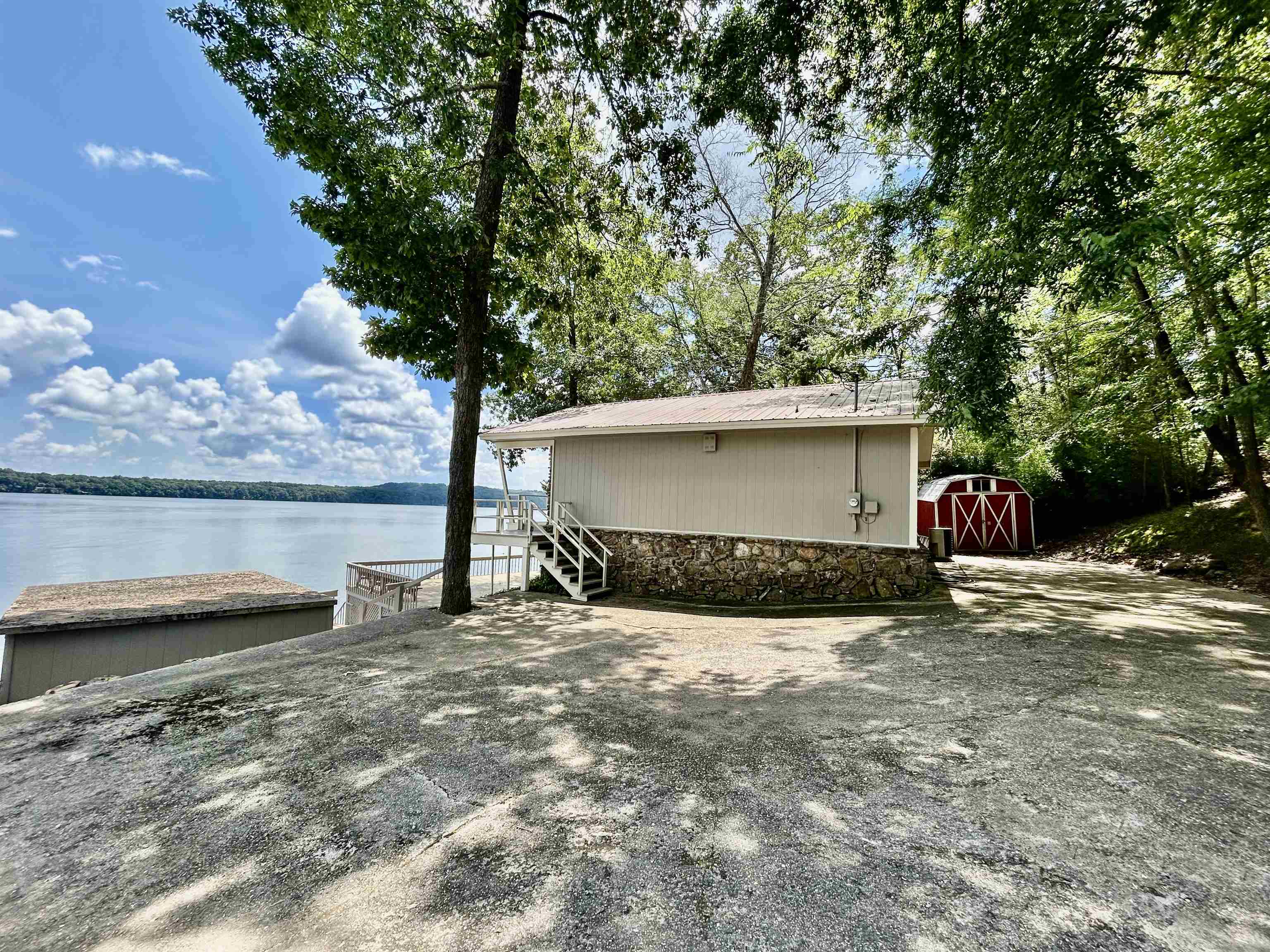 219 A Cr Iuka, MS 38852 - Photo 24 of 27 a view of a house with a yard and lake view