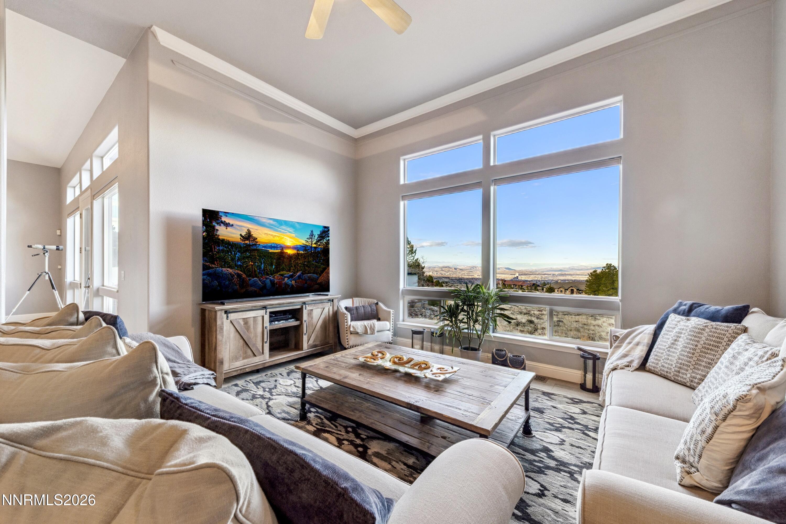 3670 Spirit Bluff Court Reno, NV 89511 - Photo 23 of 54 a living room with furniture and a flat screen tv