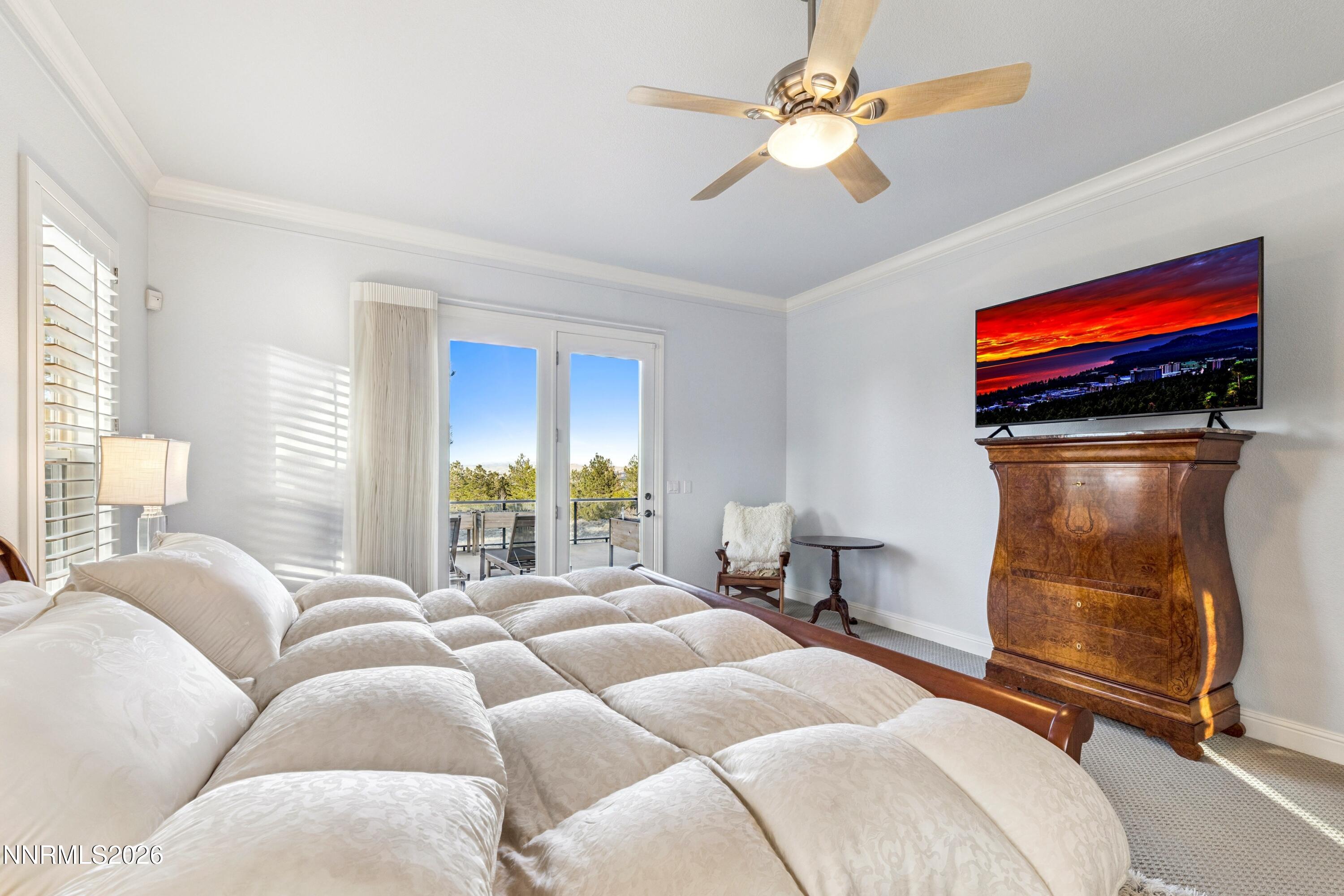 3670 Spirit Bluff Court Reno, NV 89511 - Photo 25 of 54 a bedroom with furniture and a flat screen tv