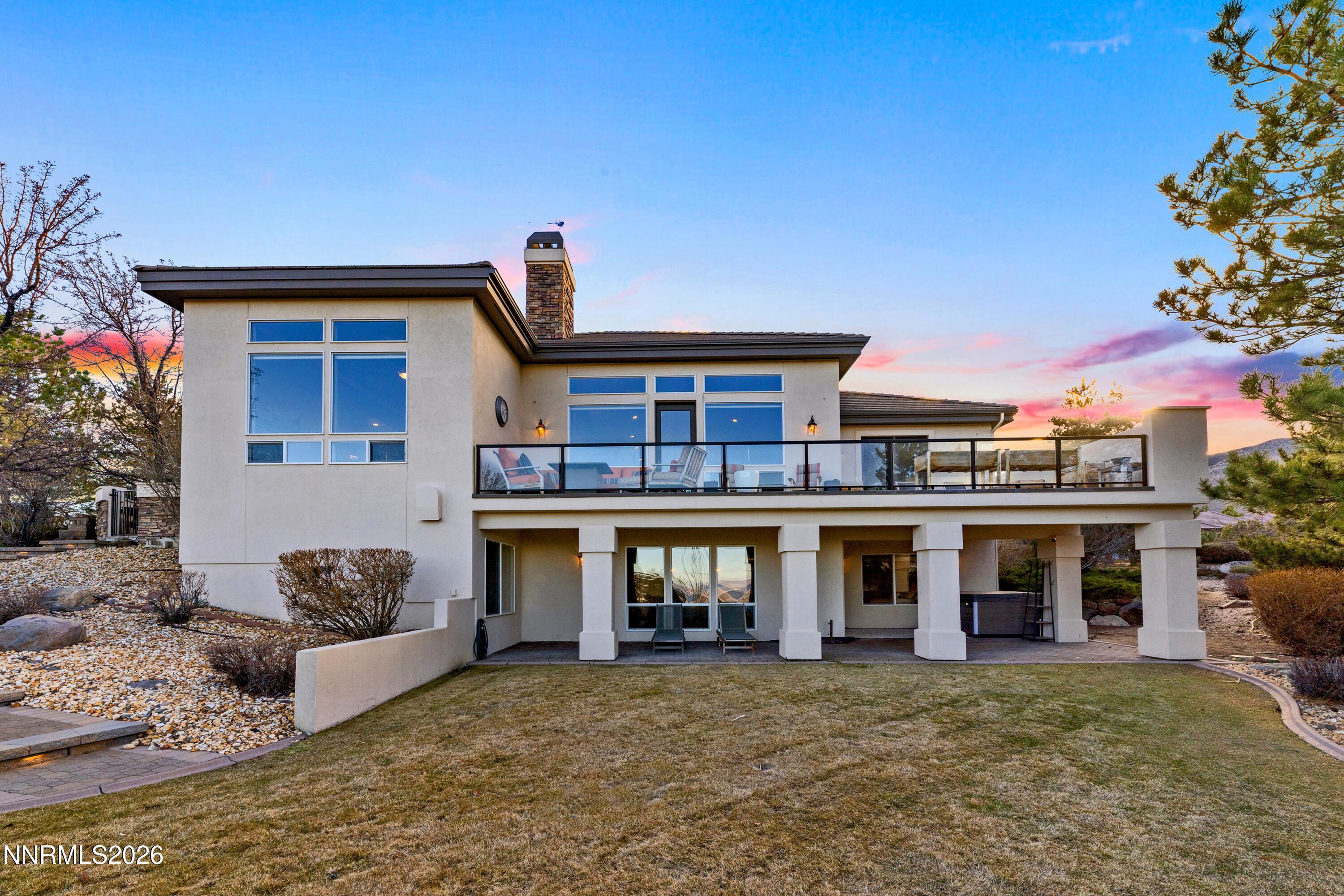 3670 Spirit Bluff Court Reno, NV 89511 - Photo 34 of 54 a front view of a house with garden