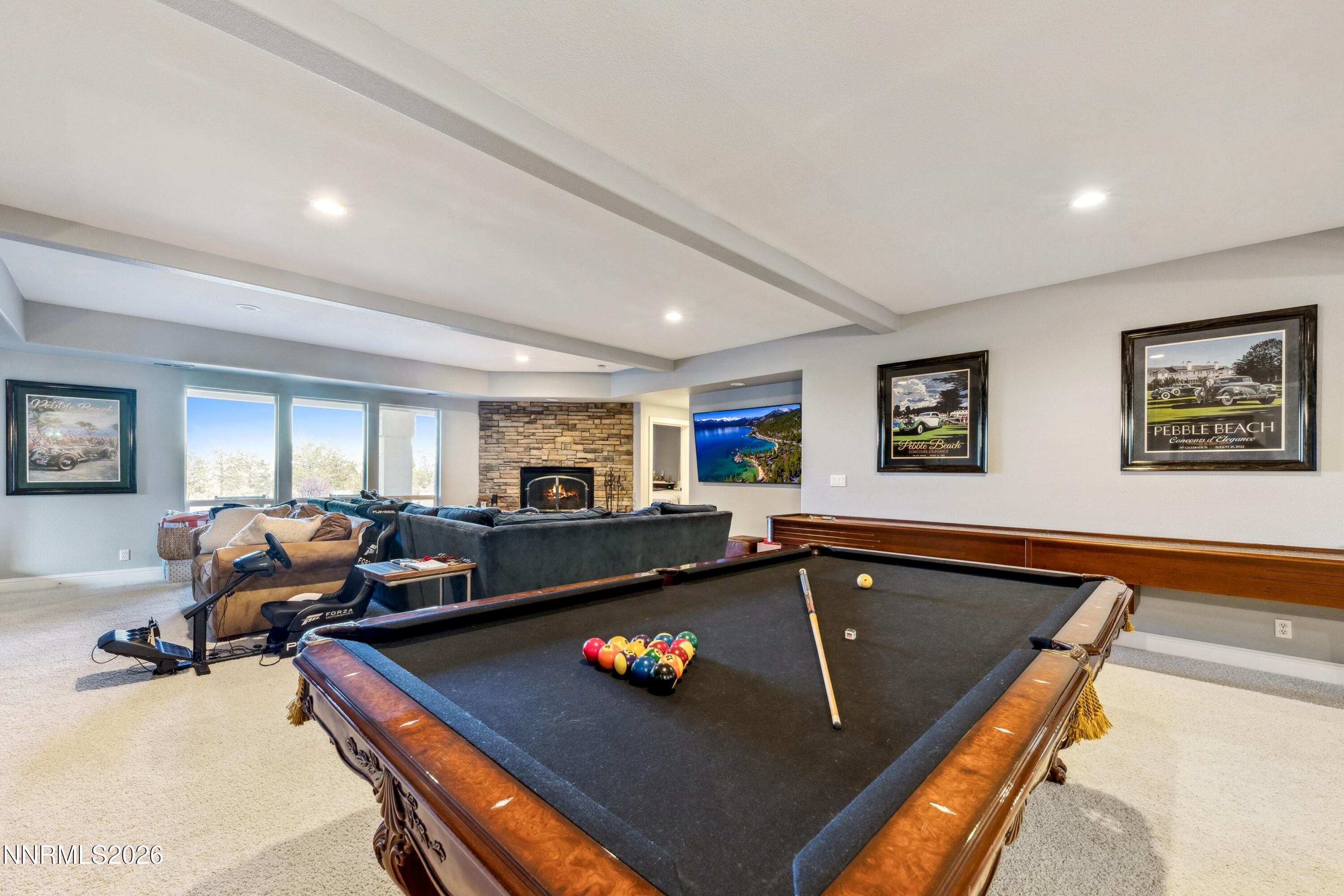 3670 Spirit Bluff Court Reno, NV 89511 - Photo 36 of 54 a living room with furniture and a flat screen tv