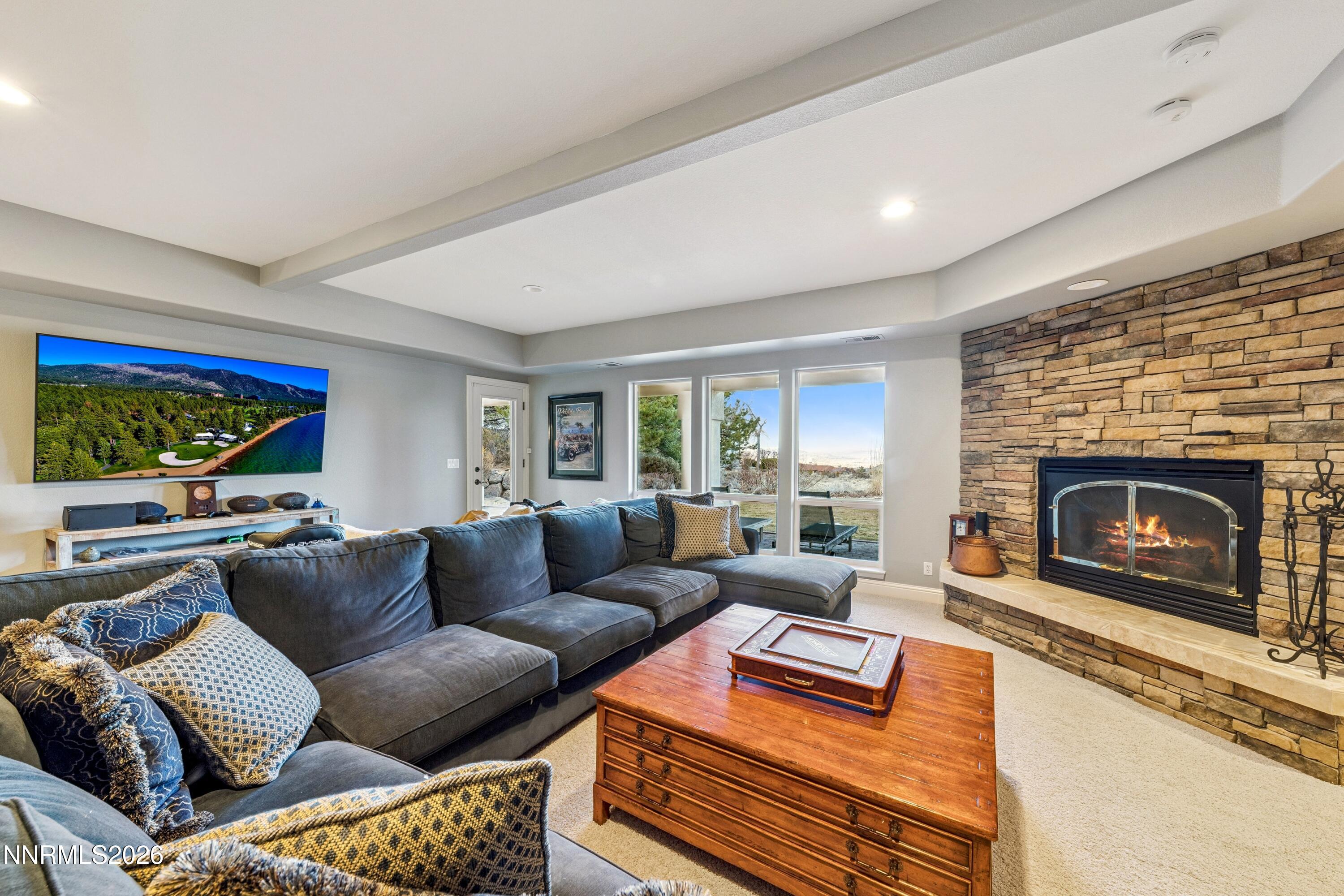 3670 Spirit Bluff Court Reno, NV 89511 - Photo 37 of 54 a living room with furniture and a fireplace
