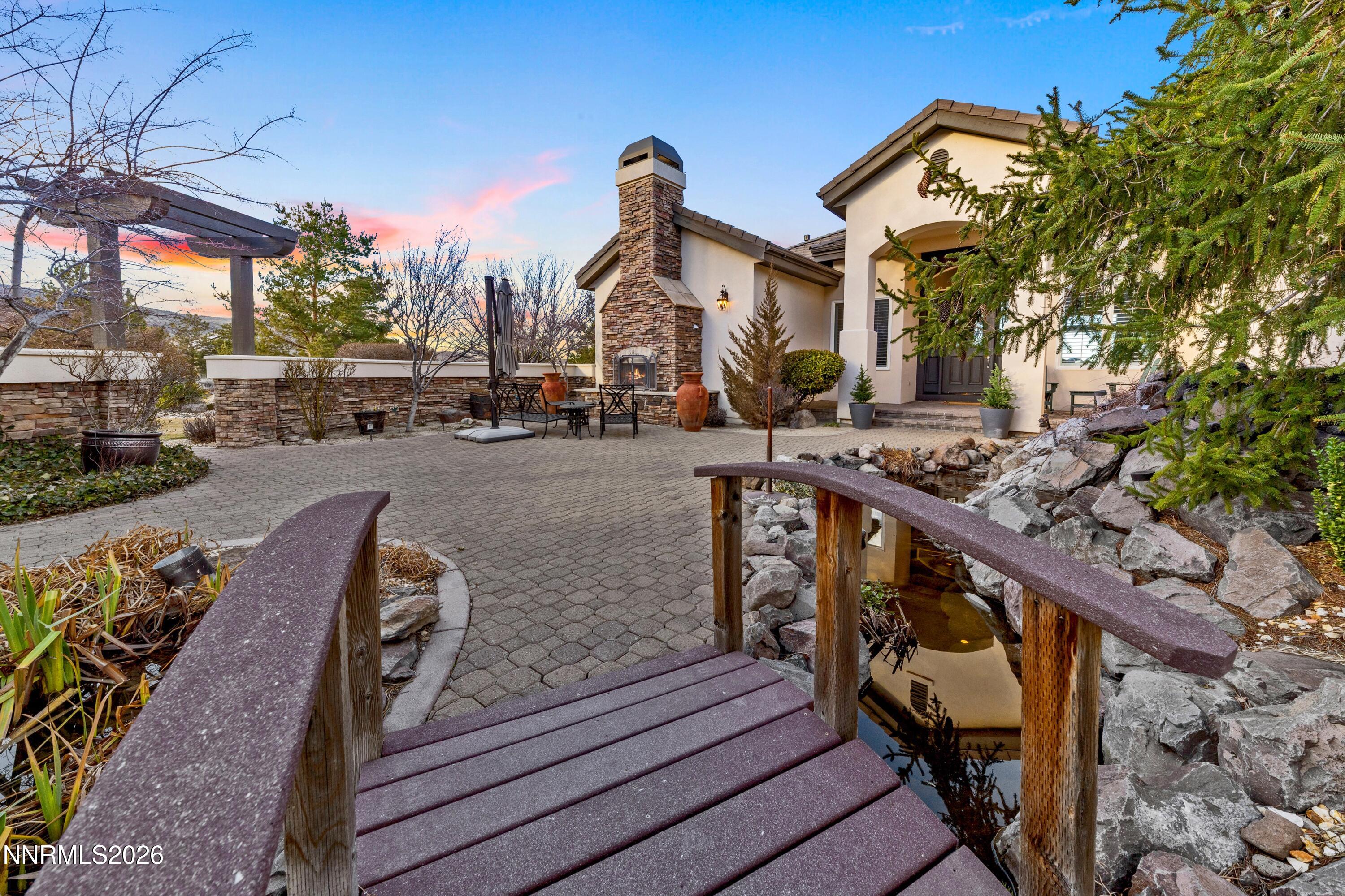 3670 Spirit Bluff Court Reno, NV 89511 - Photo 50 of 54 a view of a house with wooden deck