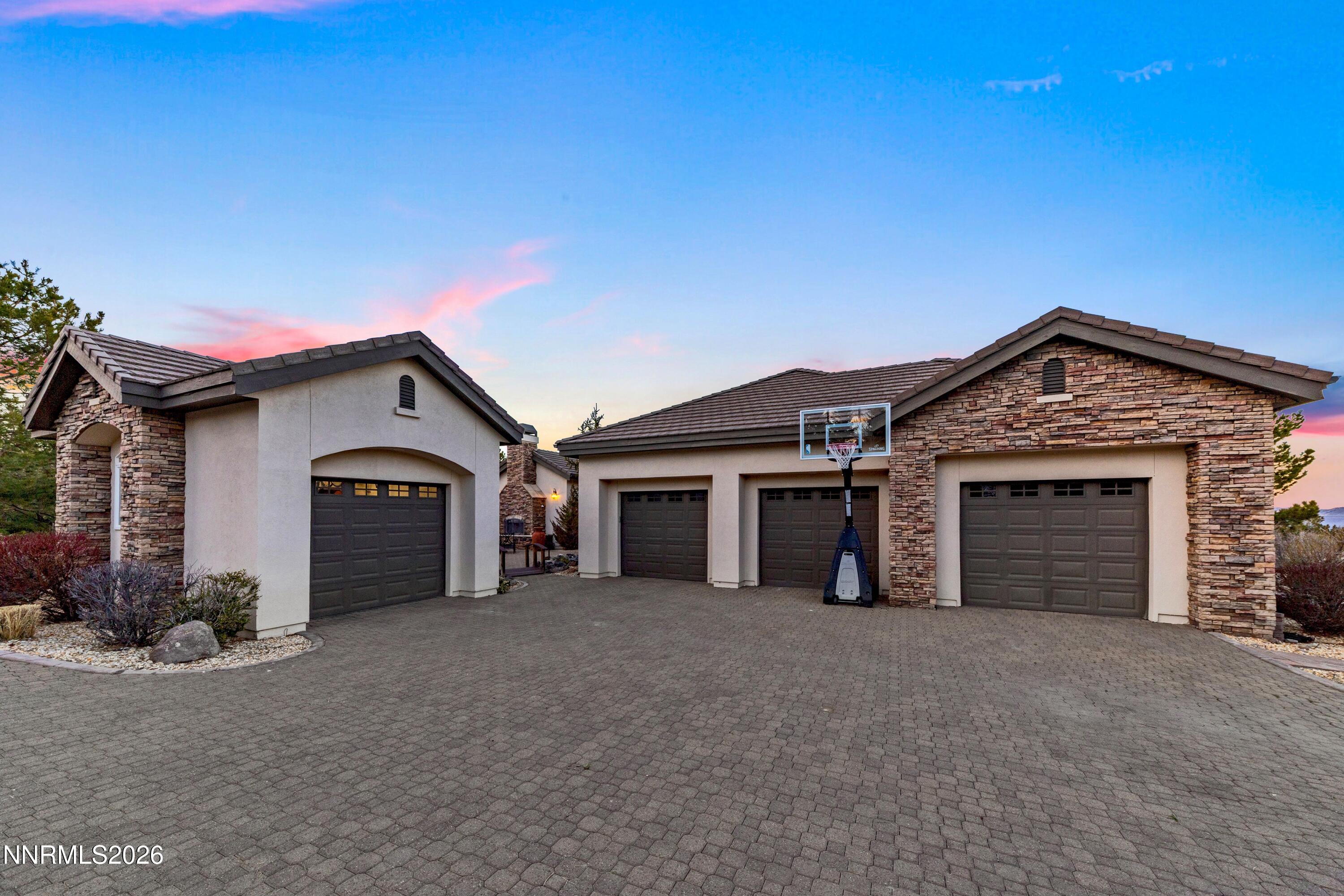 3670 Spirit Bluff Court Reno, NV 89511 - Photo 52 of 54 front view of a house with a yard