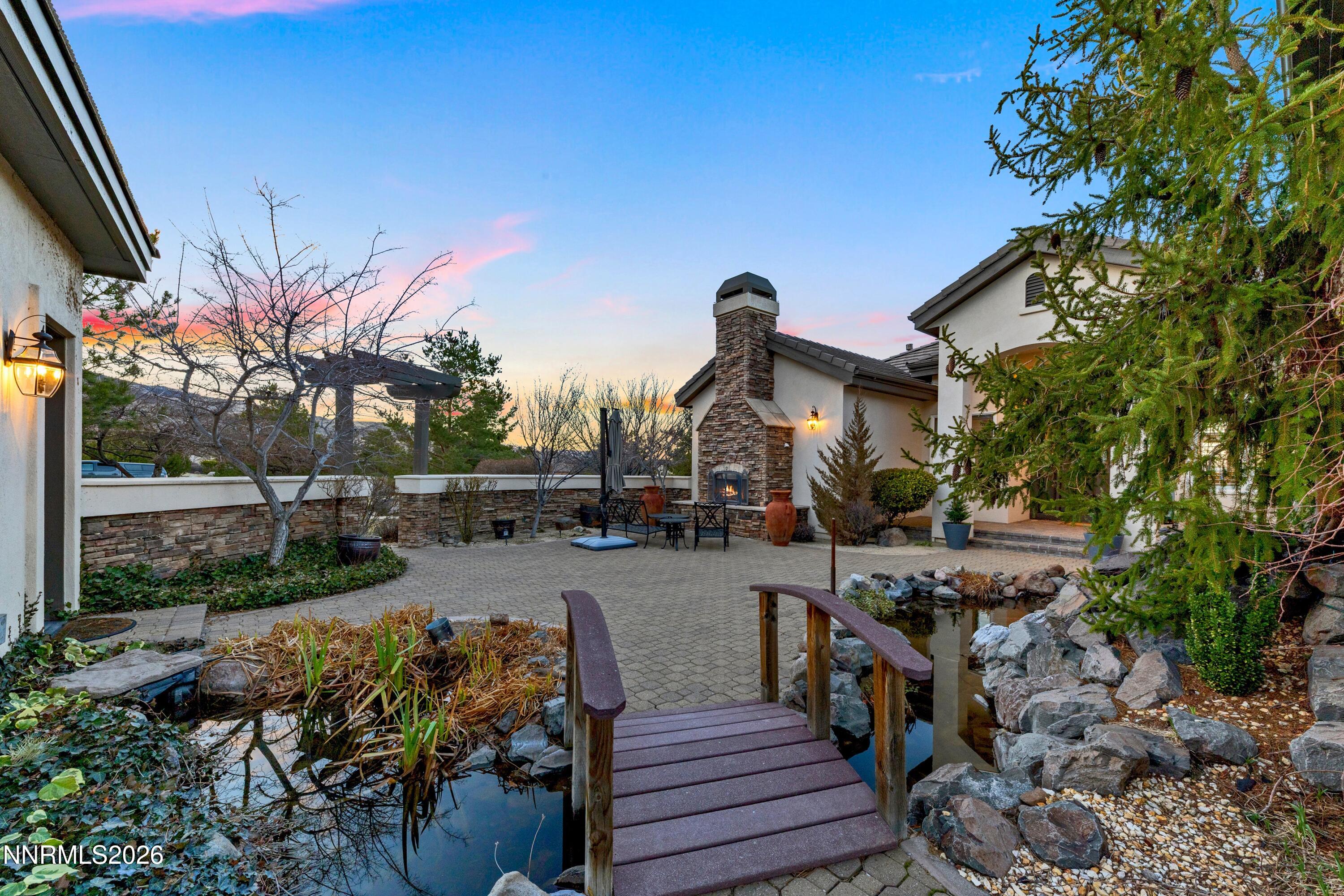 3670 Spirit Bluff Court Reno, NV 89511 - Photo 7 of 54 a view of a house with backyard and sitting area