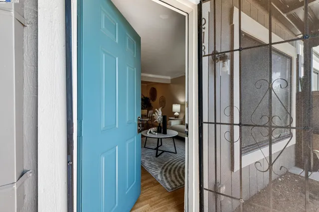 a view of a living room and bathroom