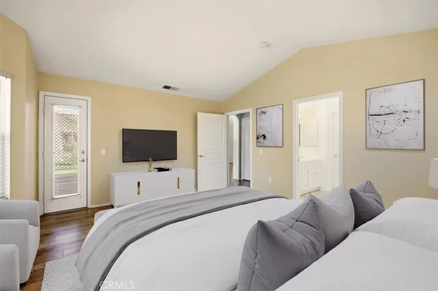 a bathroom with a granite countertop sink mirror and shower