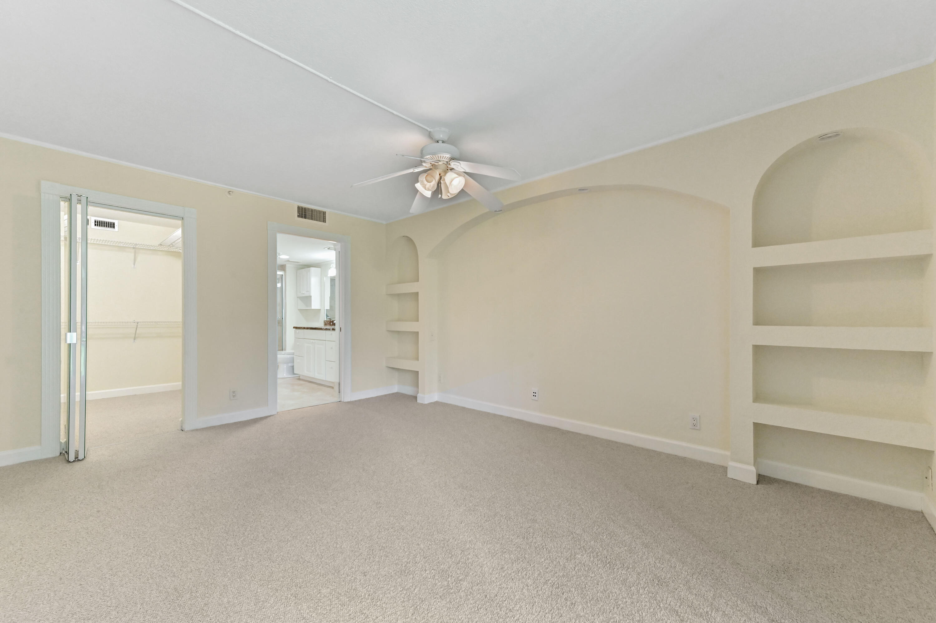 198 Northwest 67th Street, Unit 102 Boca Raton, FL 33487 - Photo 18 of 34 Primary Bedroom