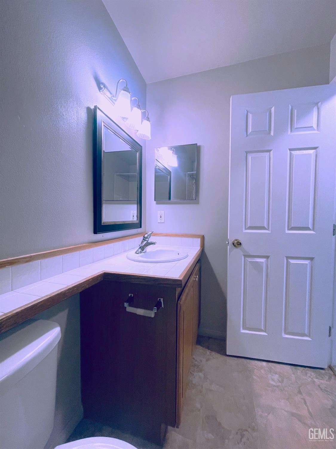 Undisclosed Address Tehachapi, CA 93561 - Photo 15 of 29 a bathroom with a sink and a mirror