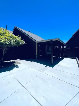 a view of backyard with potted plant
