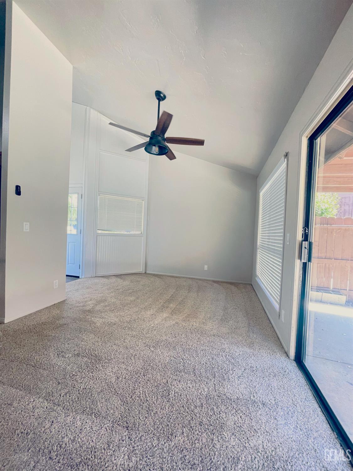 Undisclosed Address Tehachapi, CA 93561 - Photo 5 of 29 a view of a livingroom with a ceiling fan and window