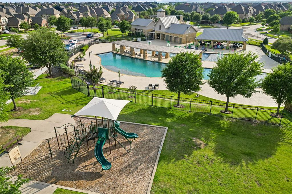 1567 Red Rock Canyon Road Frisco, TX 75036 - Photo 34 of 36 Community amenities include two resort-style pools. playgrounds and walking paths.