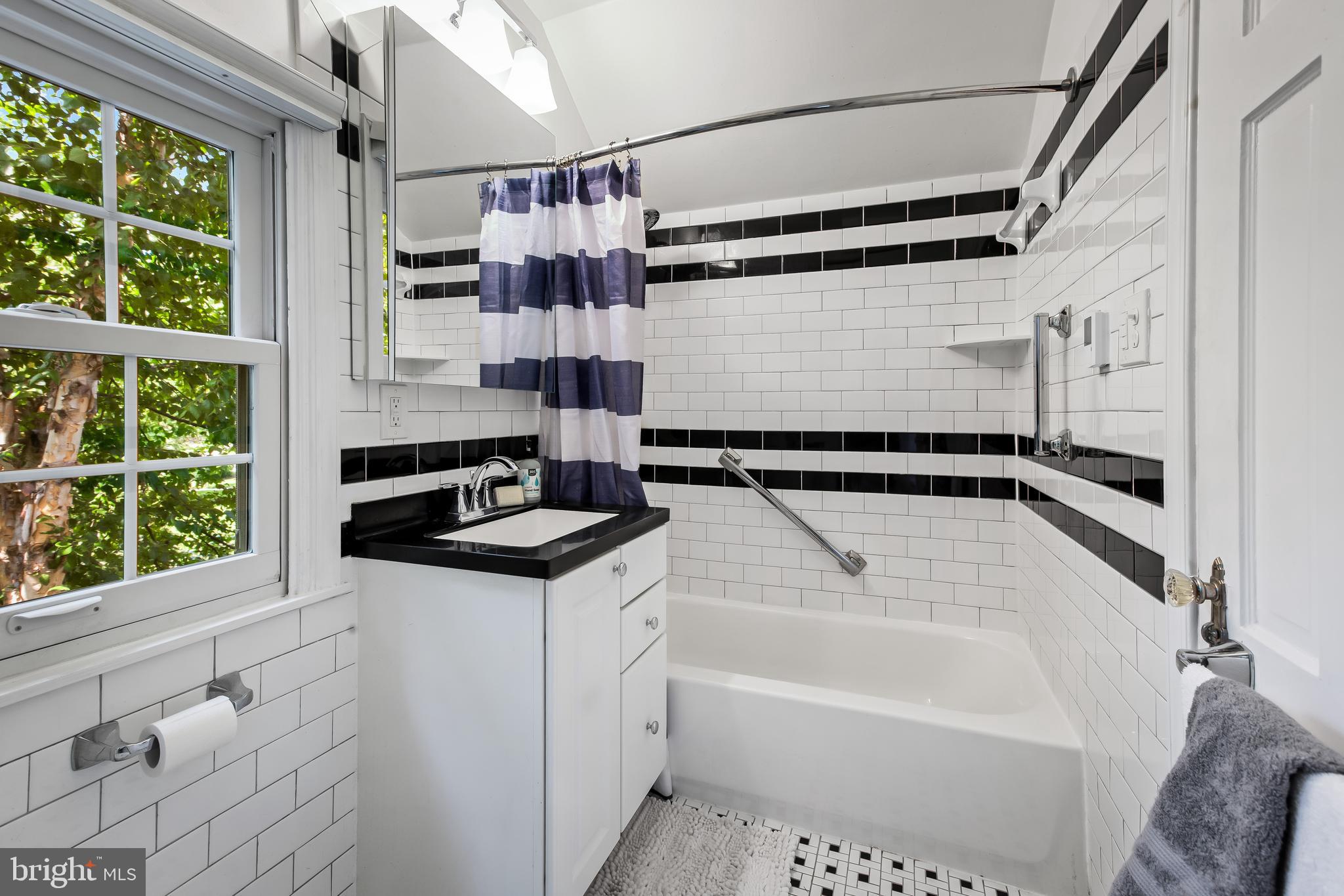 302 Weatherbee Road Towson, MD 21286 - Photo 32 of 46 hall bath. remodeled. heated floors. new tile
