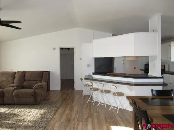 a living room with furniture and a couch