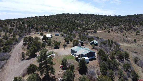 a view of a house with a park