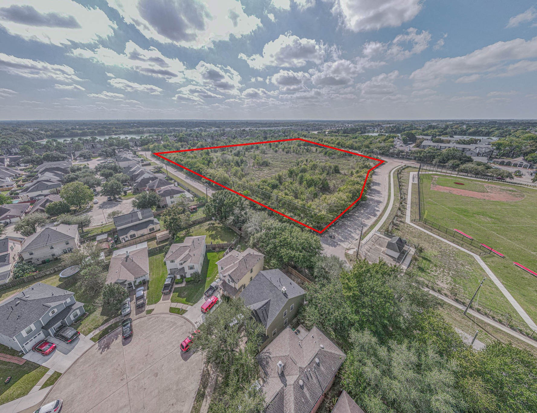 0 Windmill Lakes Boulevard Houston, TX 77075 - Photo 5 of 7 an aerial view of a city