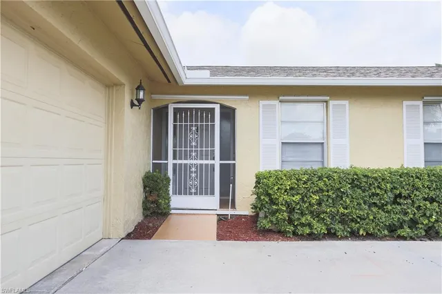 a view of outdoor space parking and barbecue grill