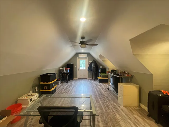 a living room with wooden floor