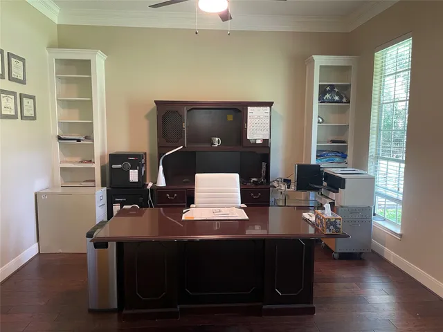 a living room with furniture and window
