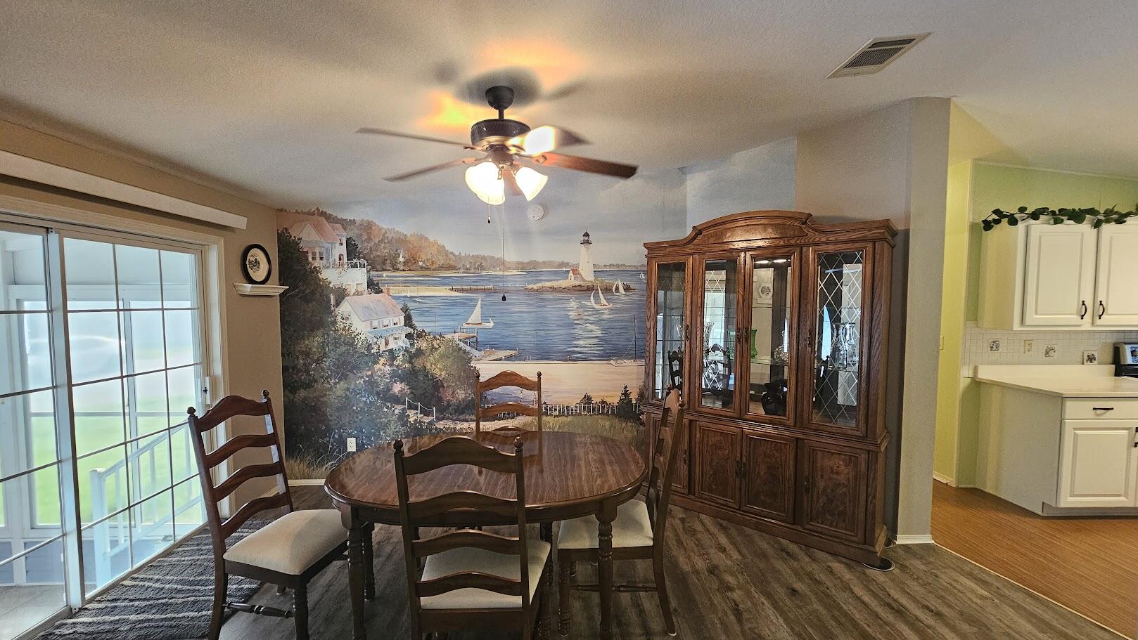 255 Shells End Place, Unit 361 Cocoa, FL 32926 - Photo 12 of 26 Dining room with Mural