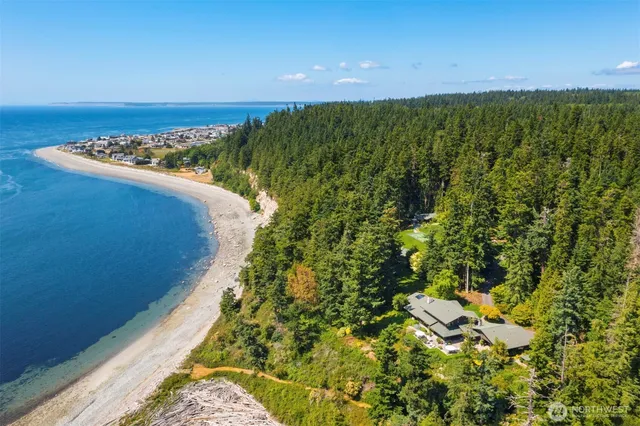 a view of a lake with a yard