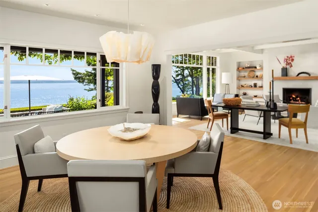 a dining room with furniture and window