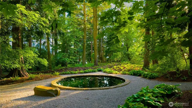 a table and chairs in a garden