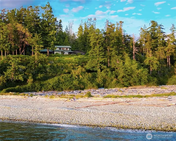 a view of a swimming pool with a yard
