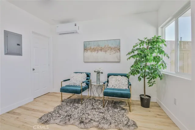 a kitchen with stainless steel appliances granite countertop a stove a refrigerator and a microwave