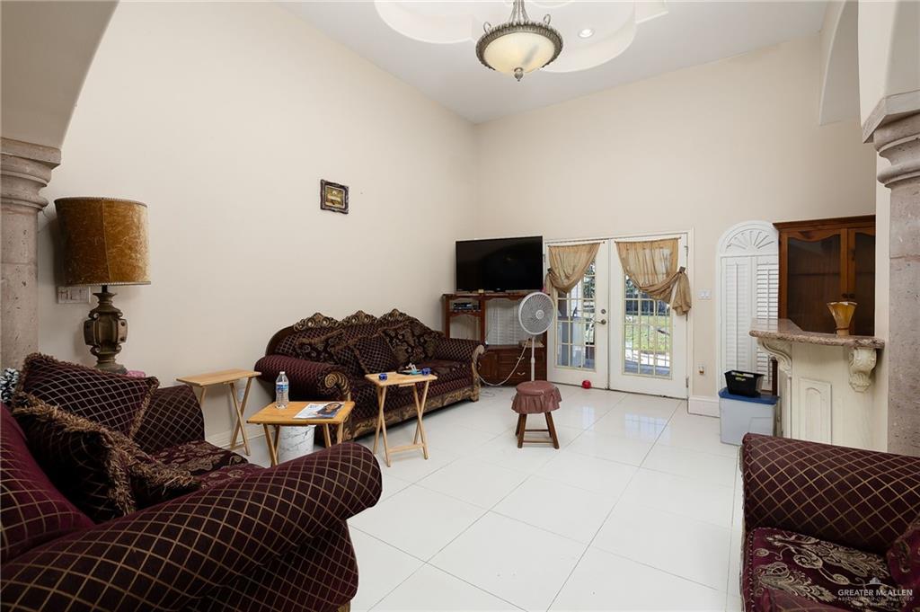 519 East Earling Road Alamo, TX 78516 - Photo 7 of 16 a living room with furniture and a flat screen tv