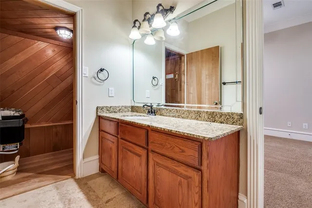 a bathroom with a sink and a toilet