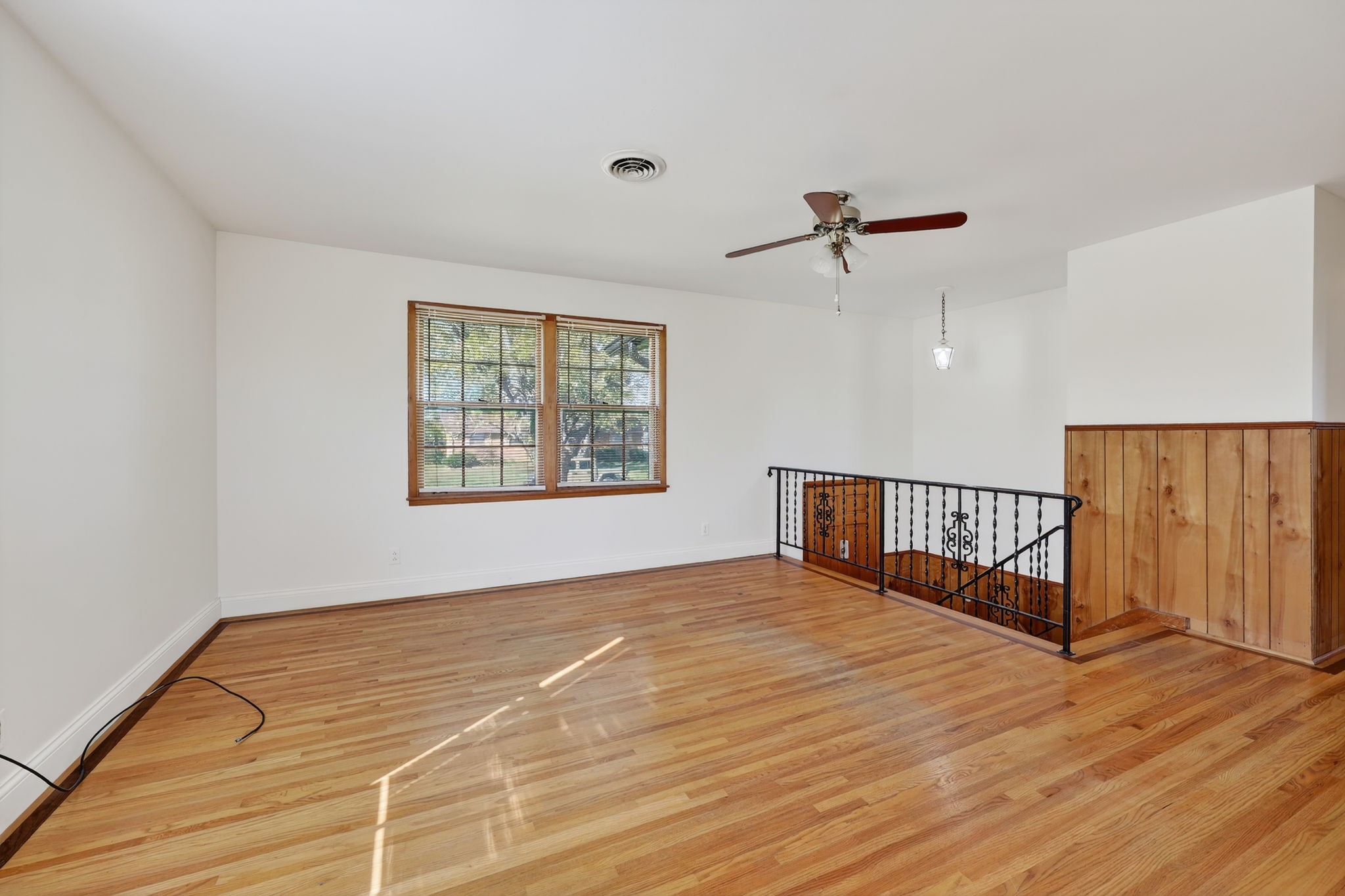 103 Fischer Drive Springfield, TN 37172 - Photo 11 of 45 a view of an empty room with wooden floor and a window