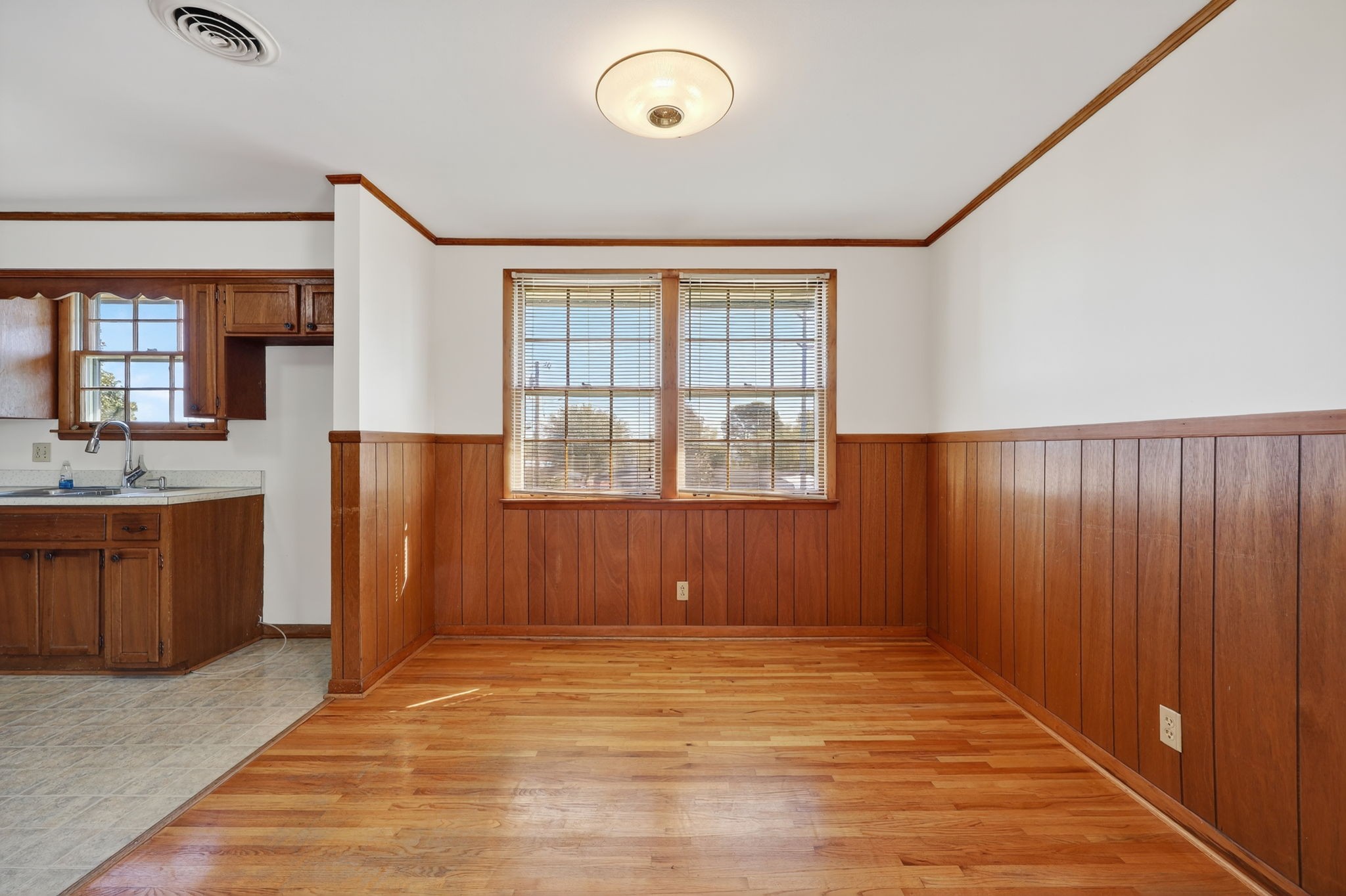 103 Fischer Drive Springfield, TN 37172 - Photo 13 of 45 an empty room with windows and cabinet